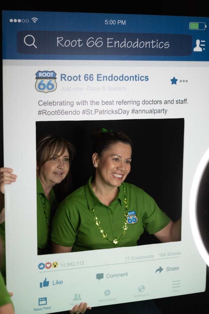 Special Events Gallery - team member posing with a root 66 endo prop in a photo boot